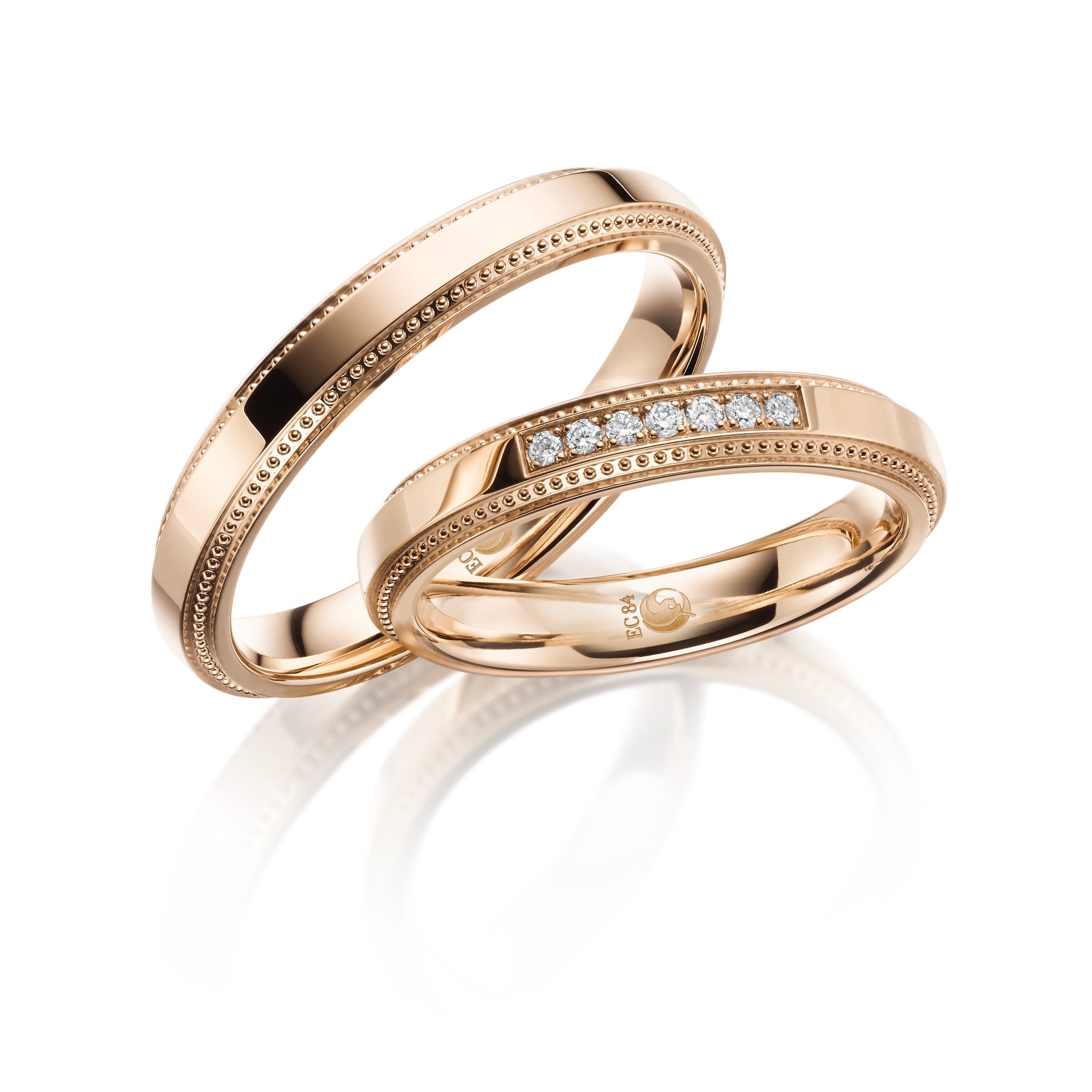 Eheringe 585 Rose Gold mit 7 Diamanten in Kanalfassung  und Perlfuge 